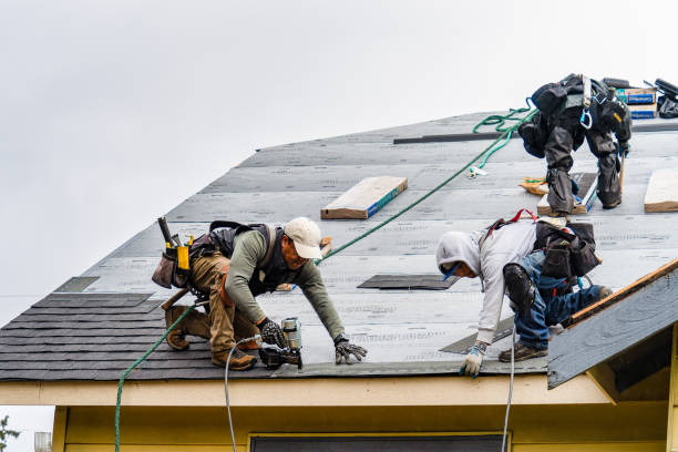 Professional Gutter Installation technician working in Wilmington, VT